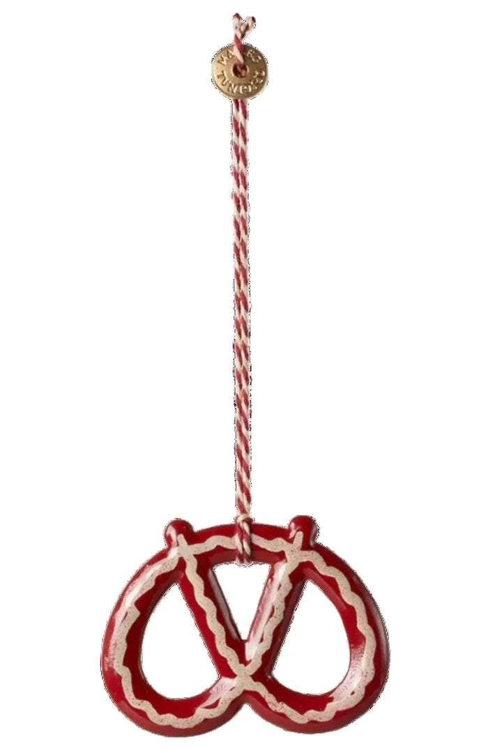 Metalophæng, Kringle - Strib